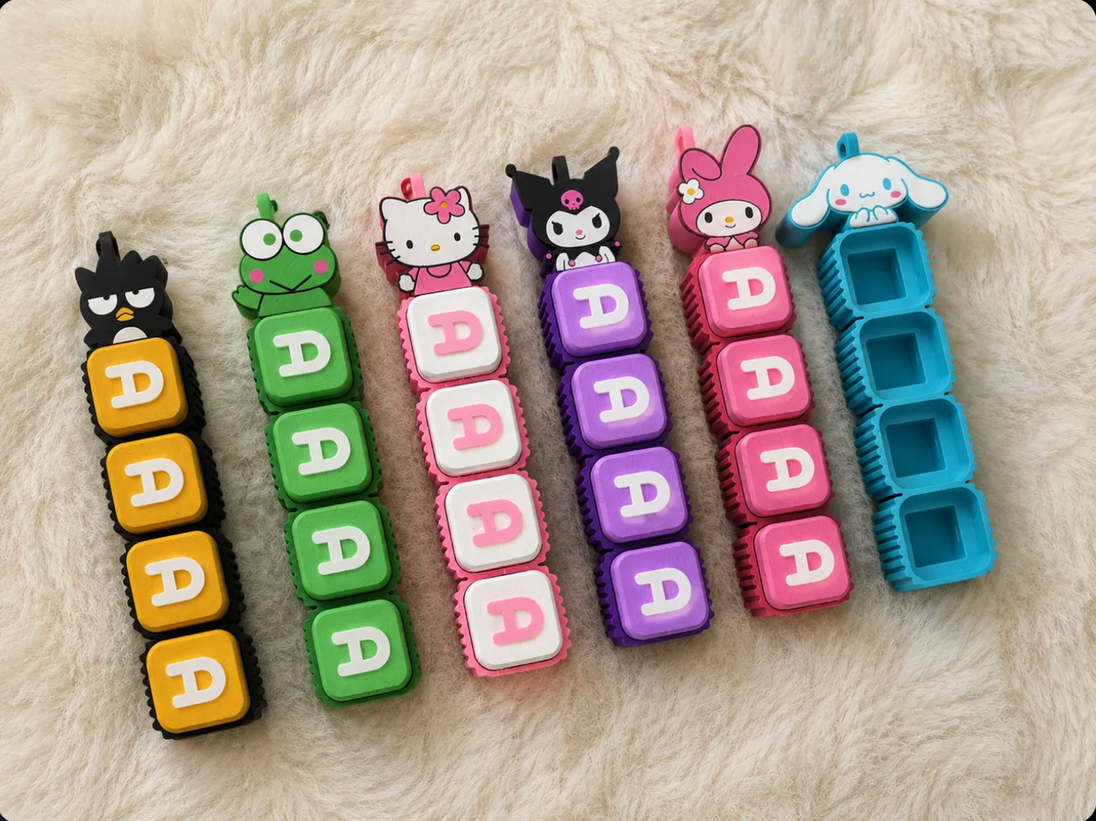 Character topper clicker keychains — Badtz-Maru, Keroppi, Hello Kitty, Kuromi, My Melody, Cinnamoroll