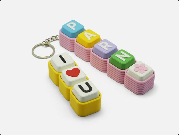 Name Clicker keychains, two examples
