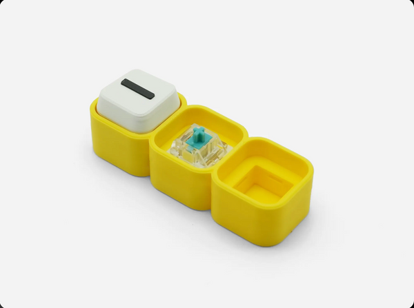 Inside a Name Clicker cube, showing the real click mechanism